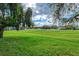 Spacious backyard featuring a golf course view at 6241 Timberlake Dr # D7, Sarasota, FL 34243