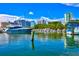 Luxury yachts and boats docked at a marina with city views at 6241 Timberlake Dr # D7, Sarasota, FL 34243