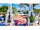 View through a decorative arch towards a marina at 6241 Timberlake Dr # D7, Sarasota, FL 34243