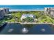 Aerial view of waterfront property with resort amenities and ocean views at 1095 Gulf Of Mexico Dr # 502, Longboat Key, FL 34228