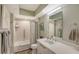 Clean bathroom with shower/tub combo and modern vanity at 1095 Gulf Of Mexico Dr # 502, Longboat Key, FL 34228