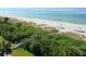 Beach access walkway leading to pristine sands at 1095 Gulf Of Mexico Dr # 502, Longboat Key, FL 34228