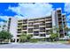 Condo building exterior, parking and landscaping at 1095 Gulf Of Mexico Dr # 502, Longboat Key, FL 34228