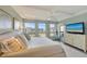 Main bedroom with water views and lots of natural light at 1095 Gulf Of Mexico Dr # 502, Longboat Key, FL 34228