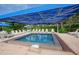 Small, refreshing pool perfect for , shaded by a large umbrella at 1095 Gulf Of Mexico Dr # 502, Longboat Key, FL 34228