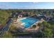 Overhead view of a community swimming pool with marked lanes and comfortable seating at 12240 Thornhill Ct, Lakewood Ranch, FL 34202