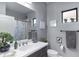 Small bathroom with a shower/tub combo, single vanity, and a modern design at 12640 Coastal Breeze Way, Bradenton, FL 34211