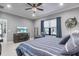 Spacious bedroom with king-size bed and large window offering natural light at 12640 Coastal Breeze Way, Bradenton, FL 34211