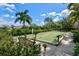 Community bocce ball court with benches for relaxing at 12640 Coastal Breeze Way, Bradenton, FL 34211