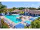 Aerial view of resort-style pool with surrounding lounge area at 12640 Coastal Breeze Way, Bradenton, FL 34211