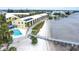 Aerial view of waterfront community with pool and pier access at 14459 River Beach Dr # 112, Port Charlotte, FL 33953