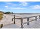 Private beach access with boardwalk leading to tranquil waterfront at 14459 River Beach Dr # 112, Port Charlotte, FL 33953