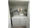 Laundry room with washer and dryer in closet at 14459 River Beach Dr # 112, Port Charlotte, FL 33953