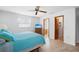 Bright bedroom with a queen bed and access to a bathroom at 1565 Piedmont Rd, Venice, FL 34293