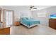 Relaxing bedroom with a comfortable bed and access to the outdoors at 1565 Piedmont Rd, Venice, FL 34293