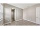 Well-lit bedroom featuring wood-look floors and a window at 21205 Holmes Cir, Venice, FL 34293