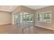 Bright dining area with sliding glass doors leading to a patio at 21205 Holmes Cir, Venice, FL 34293