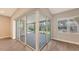 Sliding glass doors leading to a backyard patio at 21205 Holmes Cir, Venice, FL 34293