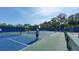 Enjoy a sunny day playing pickleball on these well-maintained courts at 21205 Holmes Cir, Venice, FL 34293