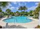 Large resort-style pool with water slide and plenty of space for swimming at 21205 Holmes Cir, Venice, FL 34293