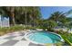 Circular hot tub with checkered tile surround at 21205 Holmes Cir, Venice, FL 34293