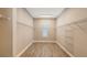 Large walk-in closet with wire shelving and ample storage space at 21205 Holmes Cir, Venice, FL 34293