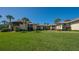 Attractive condo building with lush green lawn at 4234 Gulf Of Mexico Dr # Y2, Longboat Key, FL 34228