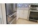 Updated kitchen with stainless steel refrigerator at 4234 Gulf Of Mexico Dr # Y2, Longboat Key, FL 34228