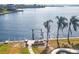 Elevated view of a private dock and calm water at 1750 Southpointe Dr, Sarasota, FL 34231