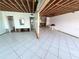 Open living area with kitchen and bathroom access at 23 Seaside Ct, Holmes Beach, FL 34217