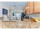 Modern kitchen with granite countertops and stainless steel appliances at 6705 Grand Estuary Trl # 206, Bradenton, FL 34212