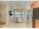 Kitchen nook with white cabinetry and a kitchen island at 6705 Grand Estuary Trl # 206, Bradenton, FL 34212
