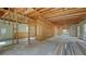 Under construction home's interior shows an open floor plan with exposed framing at 515 S Washington Dr, Sarasota, FL 34236