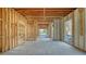 Under construction home's interior with open floor plan and exposed framing at 515 S Washington Dr, Sarasota, FL 34236