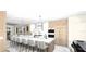 Modern kitchen design with light wood cabinets, large island, and marble countertops at 515 S Washington Dr, Sarasota, FL 34236