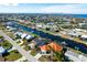 Wide aerial showcasing the home's location and waterfront access at 1732 Boca Raton Ct, Punta Gorda, FL 33950