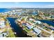 Beautiful waterfront property with canal views and lush landscaping at 1732 Boca Raton Ct, Punta Gorda, FL 33950