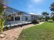 Screened pool and patio area with brick pavers at 1732 Boca Raton Ct, Punta Gorda, FL 33950