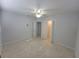 Bedroom with ceiling fan and closet at 1732 Boca Raton Ct, Punta Gorda, FL 33950