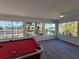 Game room with pool table and water views at 1732 Boca Raton Ct, Punta Gorda, FL 33950