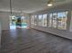 Bright Gathering room with water view and sliding doors leading to the pool at 1732 Boca Raton Ct, Punta Gorda, FL 33950