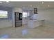 Modern kitchen featuring stainless steel appliances and white cabinets at 1732 Boca Raton Ct, Punta Gorda, FL 33950