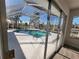 View of refreshing pool and patio area, accessible through sliding glass doors at 1732 Boca Raton Ct, Punta Gorda, FL 33950