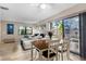 Light and airy dining area with sliding glass doors at 3415 51St Avenue W Cir # 206, Bradenton, FL 34210