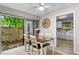 Bright dining area with table and chairs, view of kitchen at 3415 51St Avenue W Cir # 206, Bradenton, FL 34210