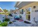 Neatly landscaped walkway leading to the front entrance of the home at 2431 Golf Course Dr # 703, Sarasota, FL 34234