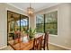 A lovely breakfast nook offers great natural light with access to the lanai at 340 Cedar Falls Dr, Apollo Beach, FL 33572