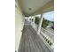 Wooden deck overlooking residential street at 4707 Woodbrook Dr, Sarasota, FL 34243