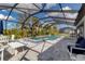 Screened-in pool and spa with ample lounge space at 10739 Spring Tide Way, Parrish, FL 34219