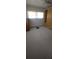 Well-lit bedroom offering comfortable carpet and a calming environment at 1208 44Th Avenue E Dr, Ellenton, FL 34222